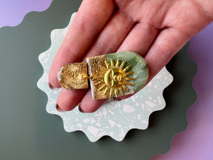 Green and gold sun earrings