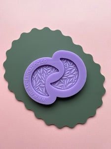 Engraved leafy moon mould