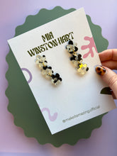 Load image into Gallery viewer, Cow print flower earrings
