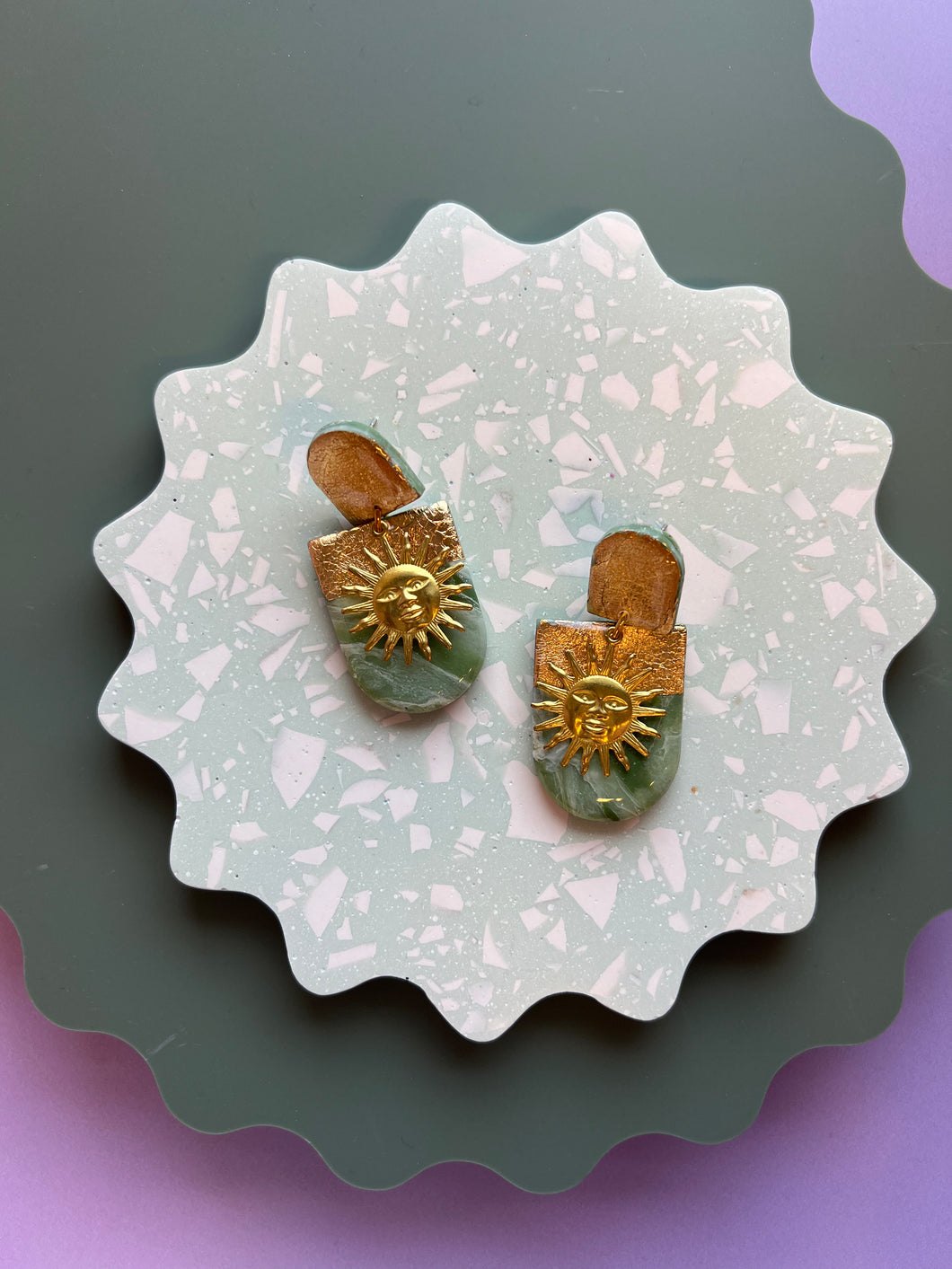 Green and gold sun earrings