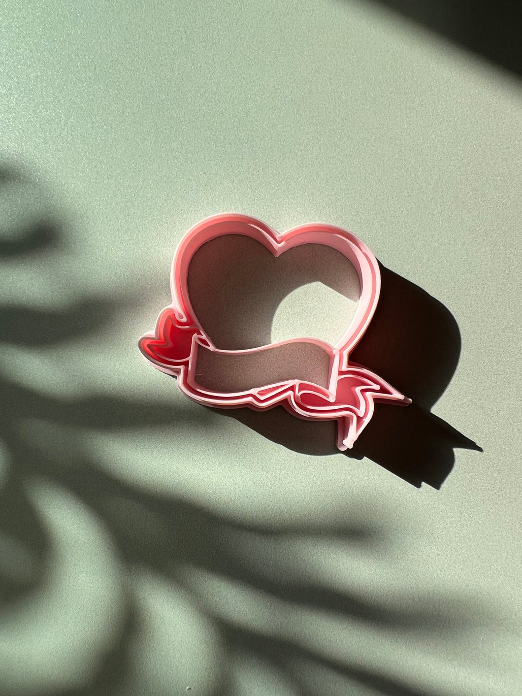 Scrolled heart cutter